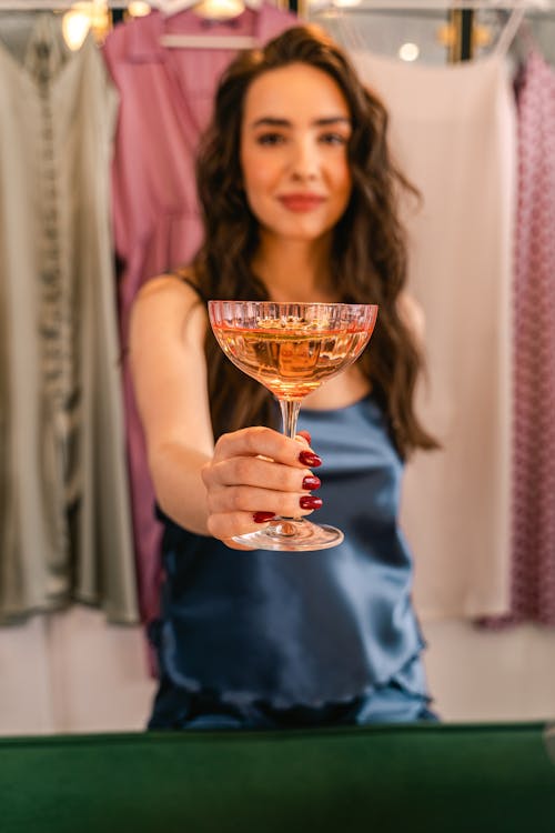 Woman in Black Tank Top Holding Clear Wine Glass