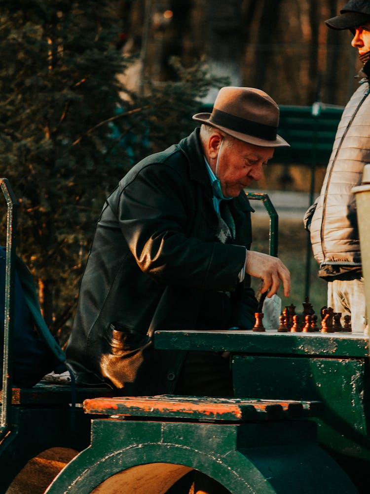 Man Playing Chess In The Park