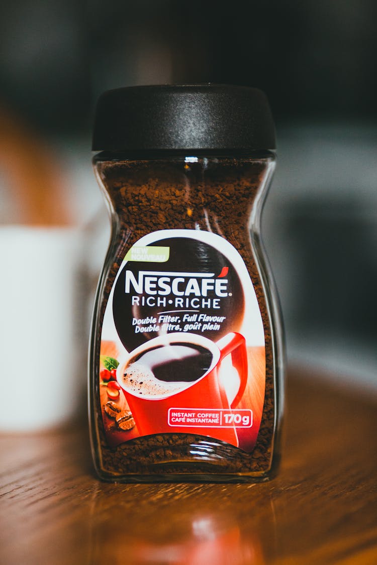 Instant Coffee Jar On Wooden Table