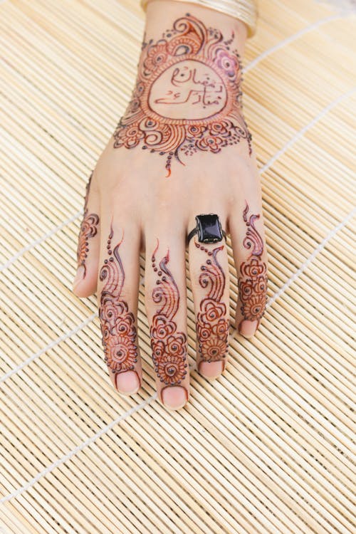 Free Close-Up Shot of a Hand with Mehndi Tattoo Stock Photo