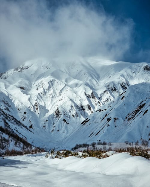 Photo of a Mountain Covered with Snow