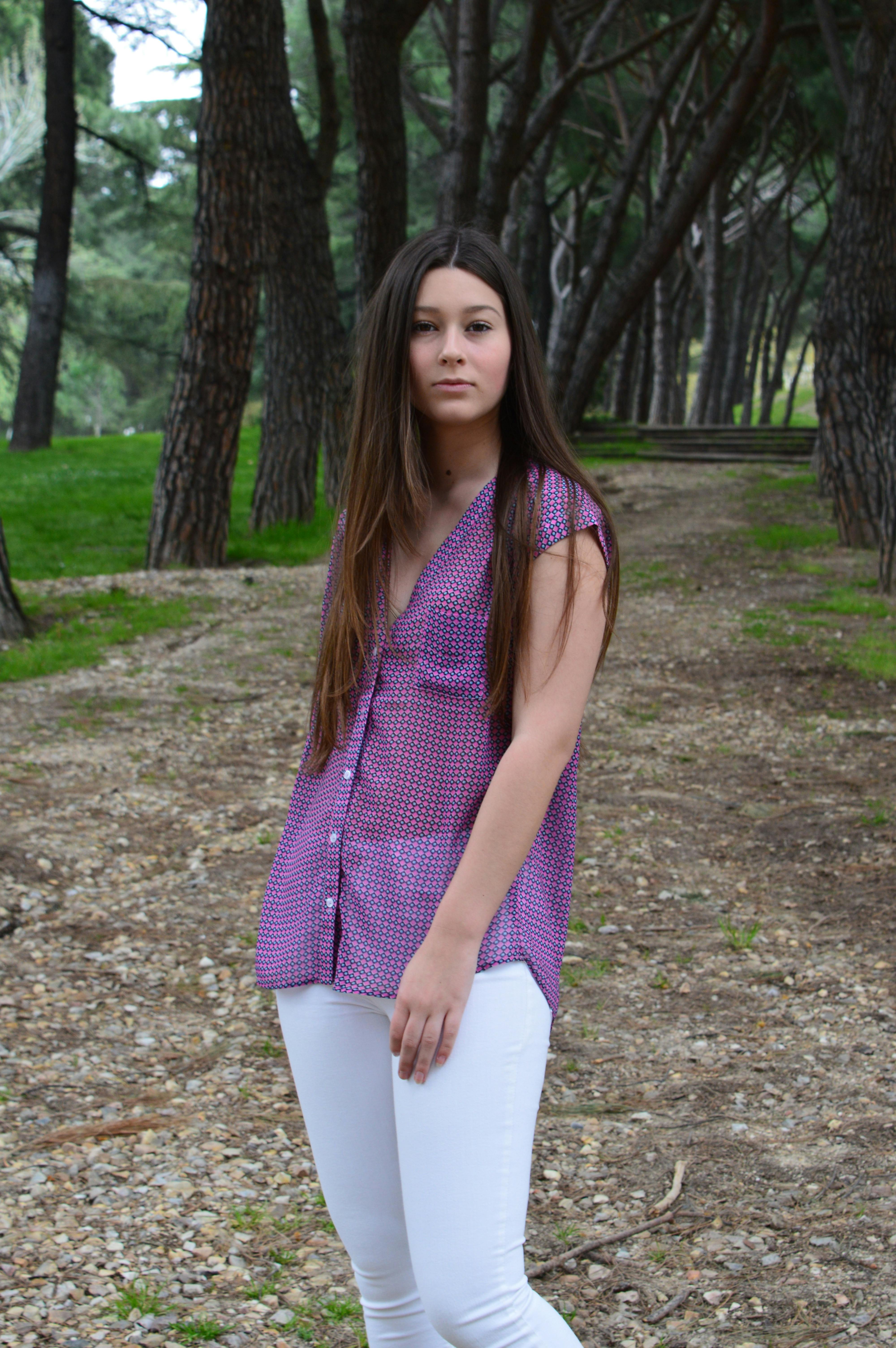 Woman in Purple Sleeveless Shirt and White Pants · Free Stock Photo