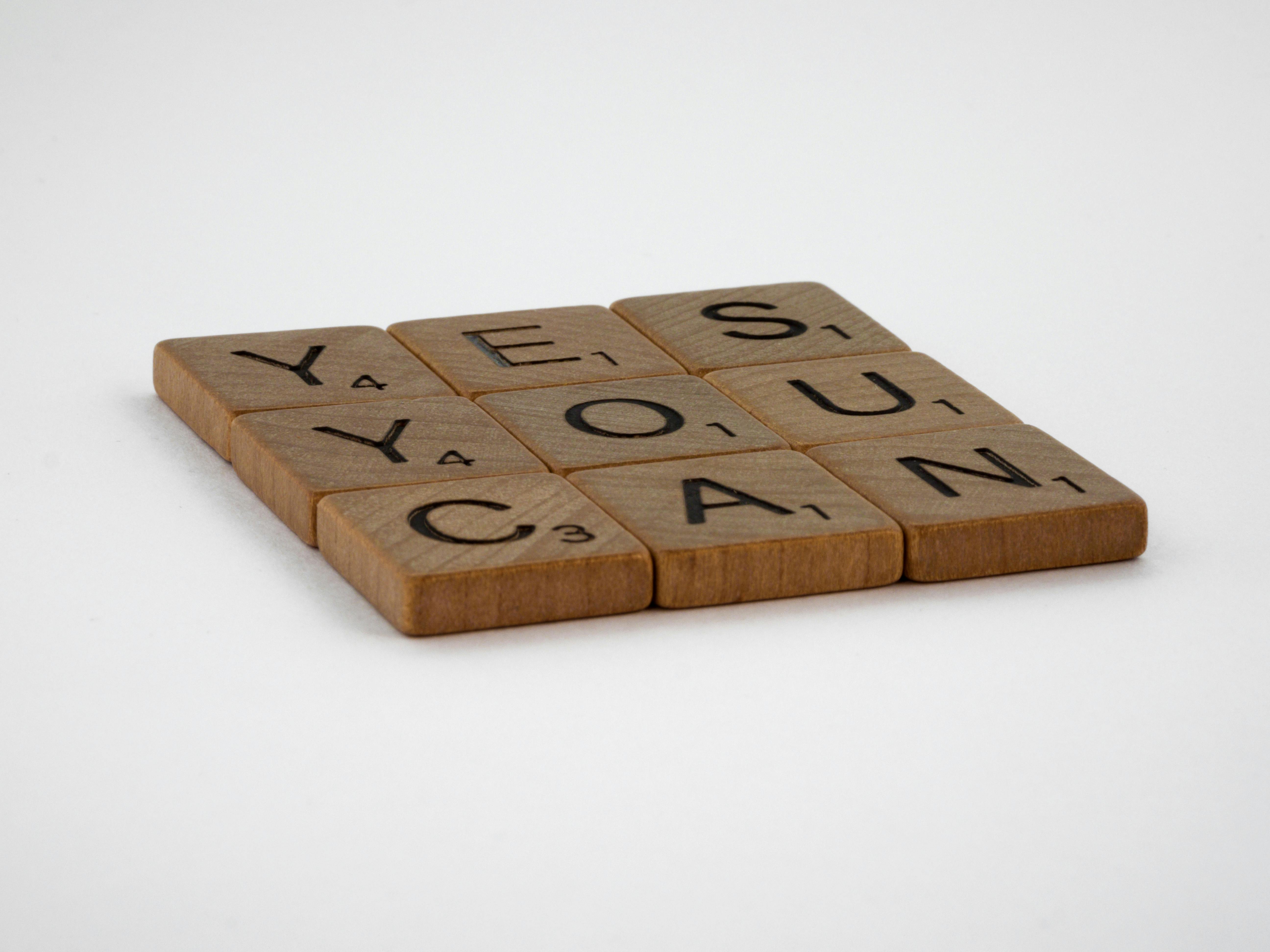 close up photo of yes you can text on white surface