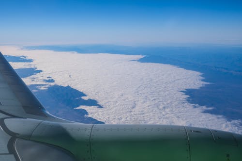 Immagine gratuita di aeroplano, cielo azzurro, coperto di neve