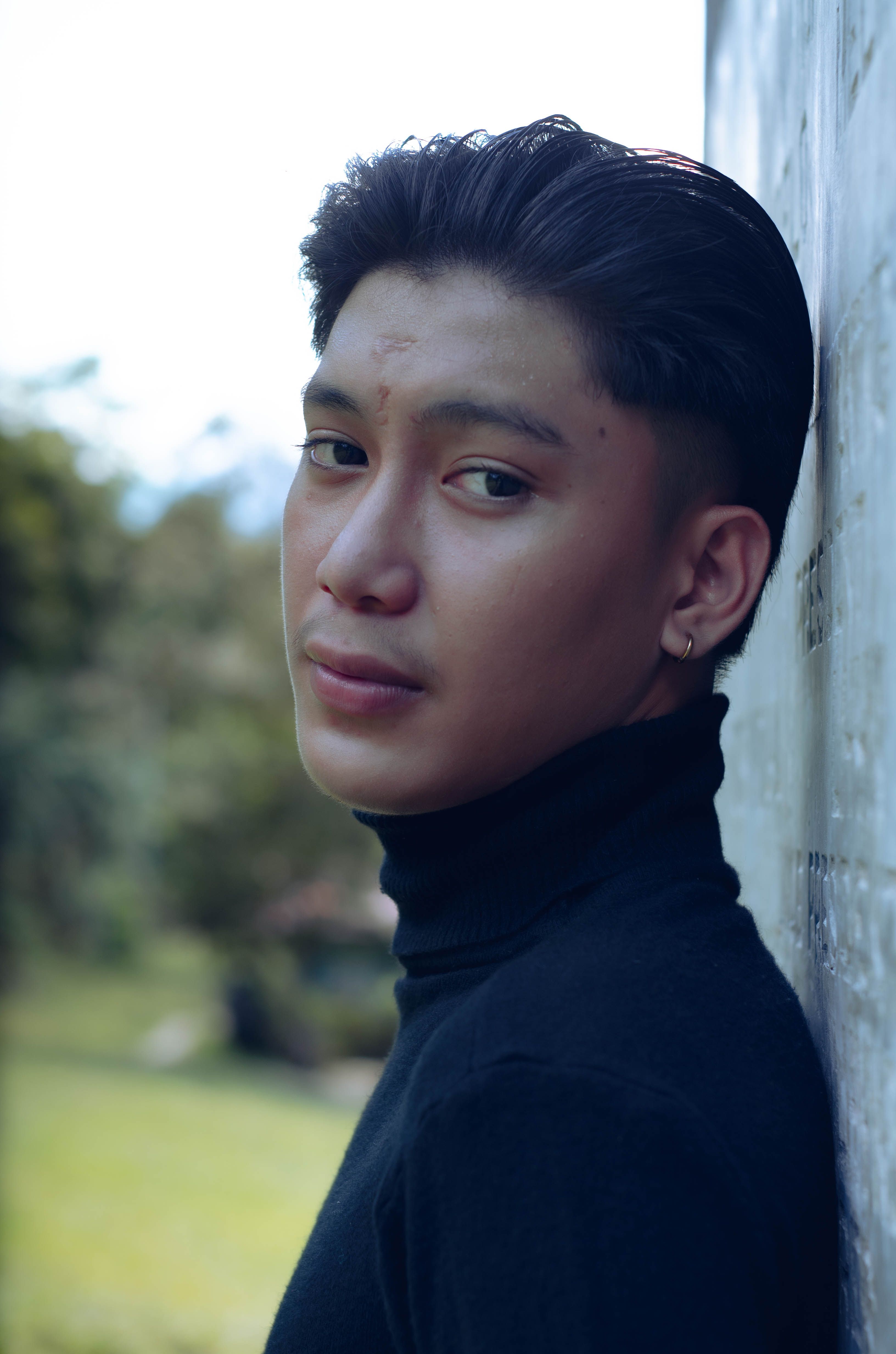 A Man Wearing a Black Turtle Neck Shirt · Free Stock Photo
