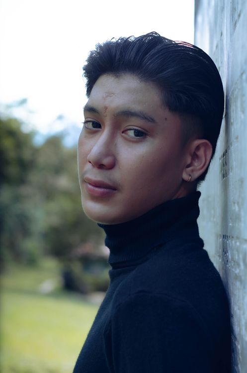 A Man Wearing a Black Turtle Neck Shirt · Free Stock Photo