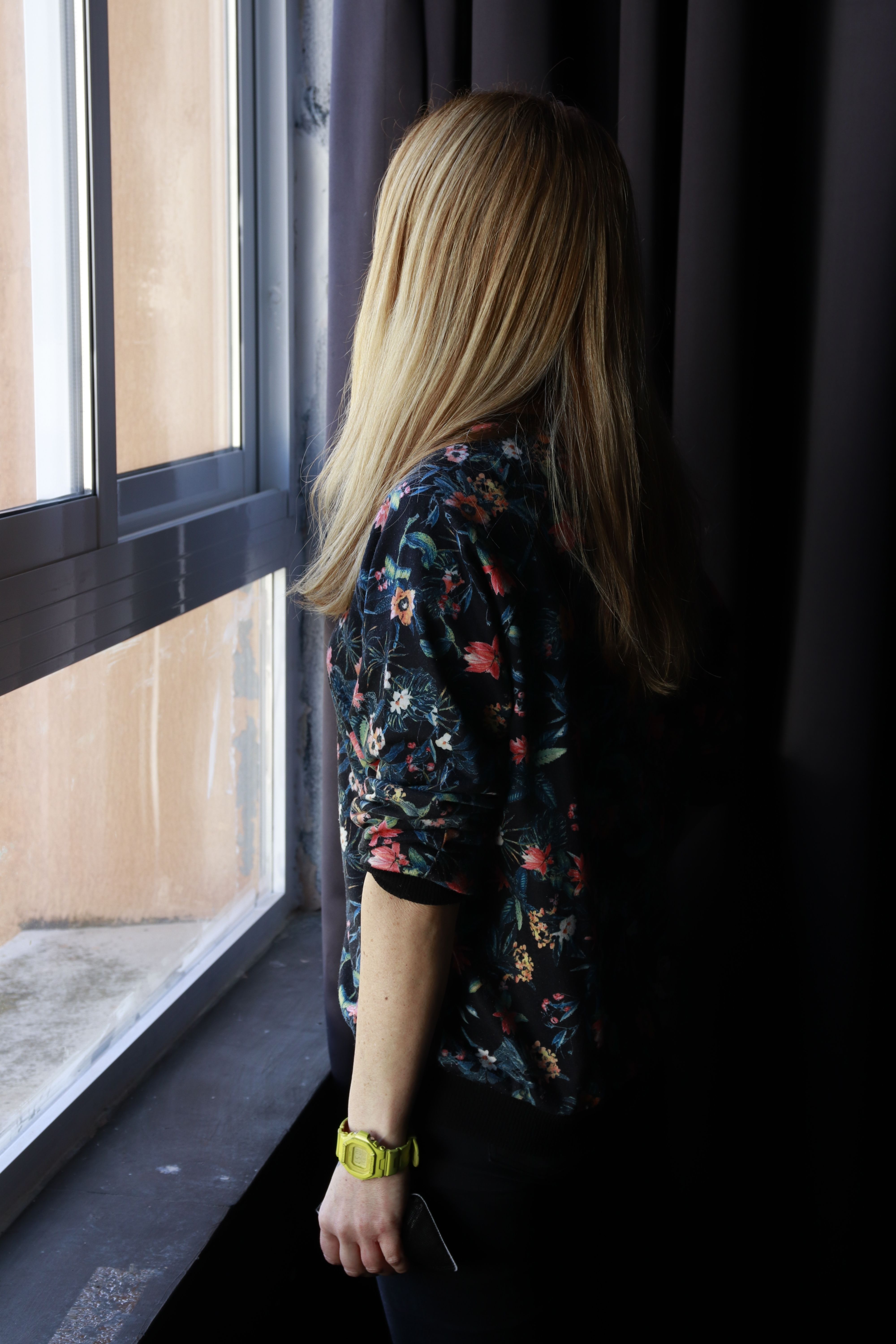A Woman Looking Outside the Window · Free Stock Photo
