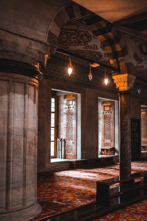 Free Explore the luxurious and intricate design of a historic stone building's interior. Stock Photo