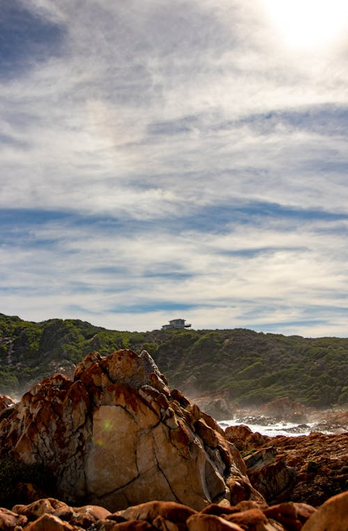 Free Rock Formation on the Seashore Stock Photo