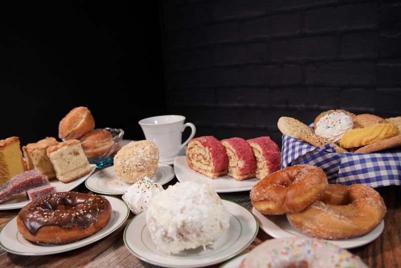 rolling cart with coffee and pastries