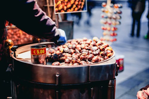 Free Person Selling Chestnuts Stock Photo