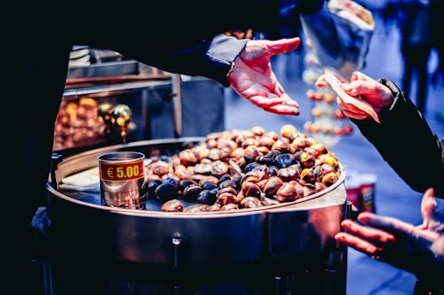 Free Person Paying Bill in Front of Nuts Stock Photo