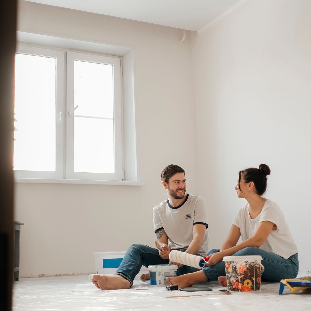 A happy couple in their freshly painted new home