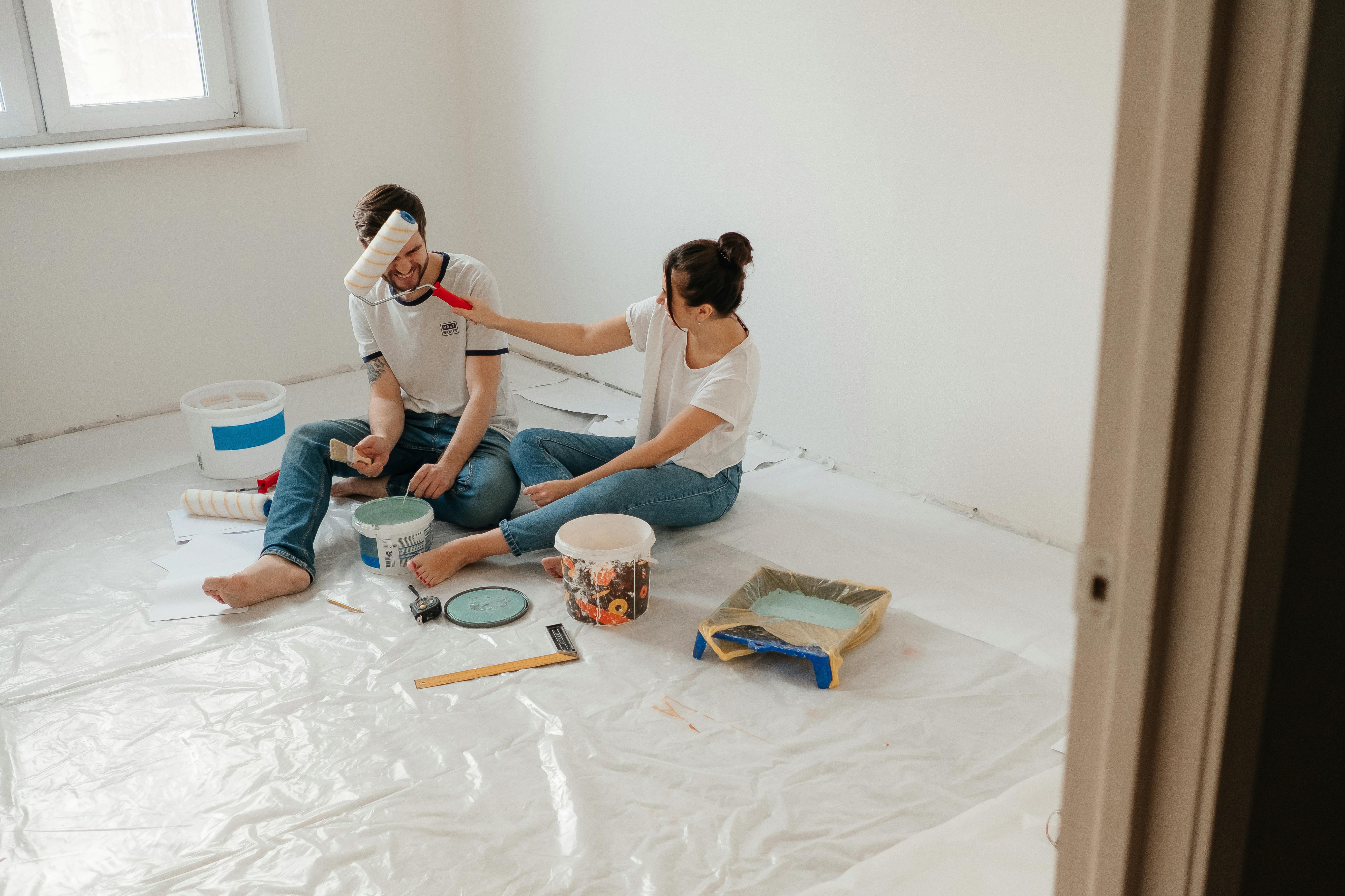a couple sitting on the floor
