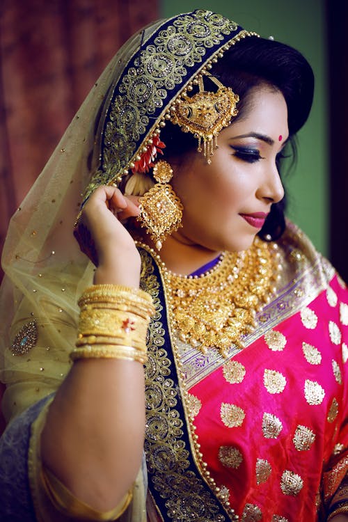 A Beautiful Woman in Red Sari · Free Stock Photo