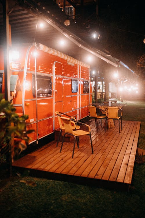 Orange van with table and chairs