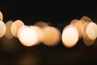 Abstract bokeh background of overlapped lights in evening