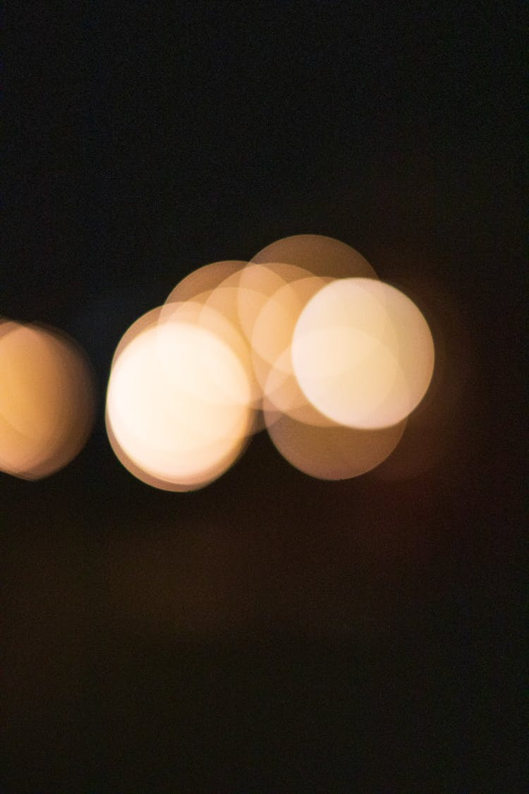 Abstract Bokeh Backdrop Of Multiplying Lights At Night