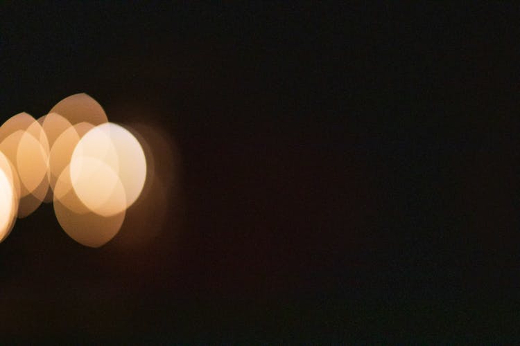 Abstract Bokeh Backdrop Of Multiplying Lights In Evening