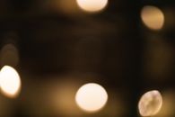 Abstract bokeh background with shiny lights at dusk
