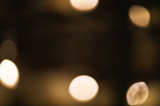 Abstract bokeh background with shiny lights at dusk