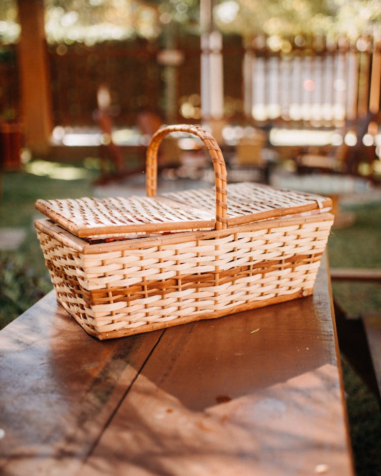 Wicker Basket On Sunny Backyard