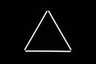 White triangle on black background