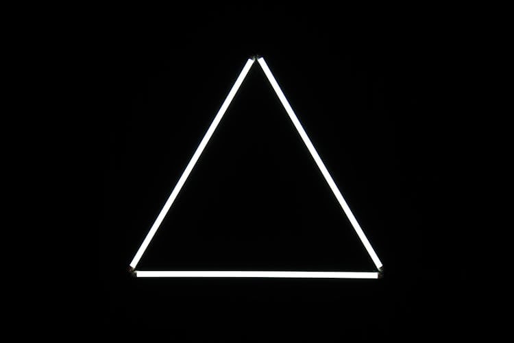 White Triangle On Black Background