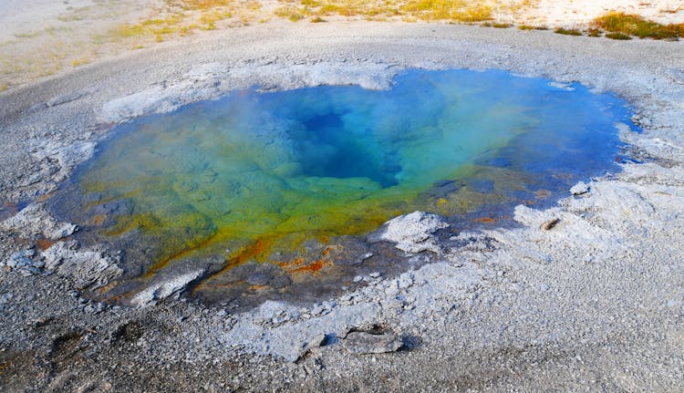 Iridescent Bitumen Oil And Ash On A Ground