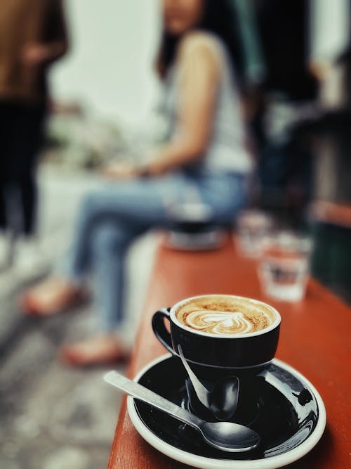 Black Ceramic Mug With Coffee