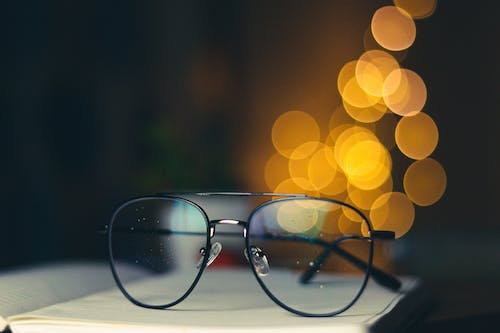 Black Framed Eyeglasses on the Table