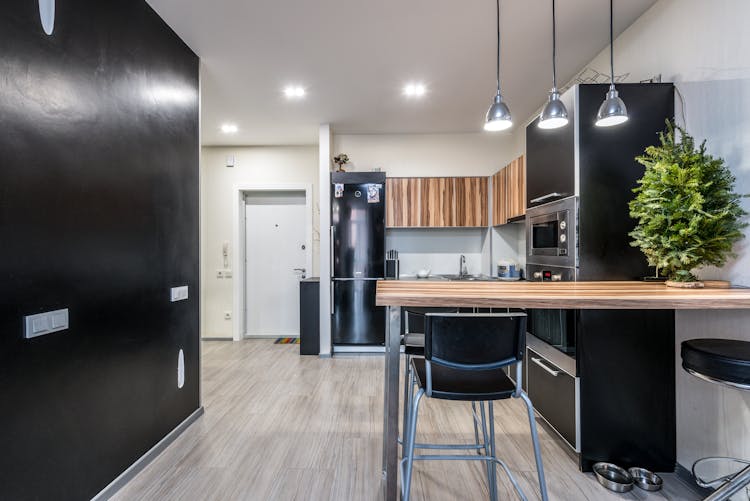 Contemporary Kitchen Interior With Built In Ovens And Counter