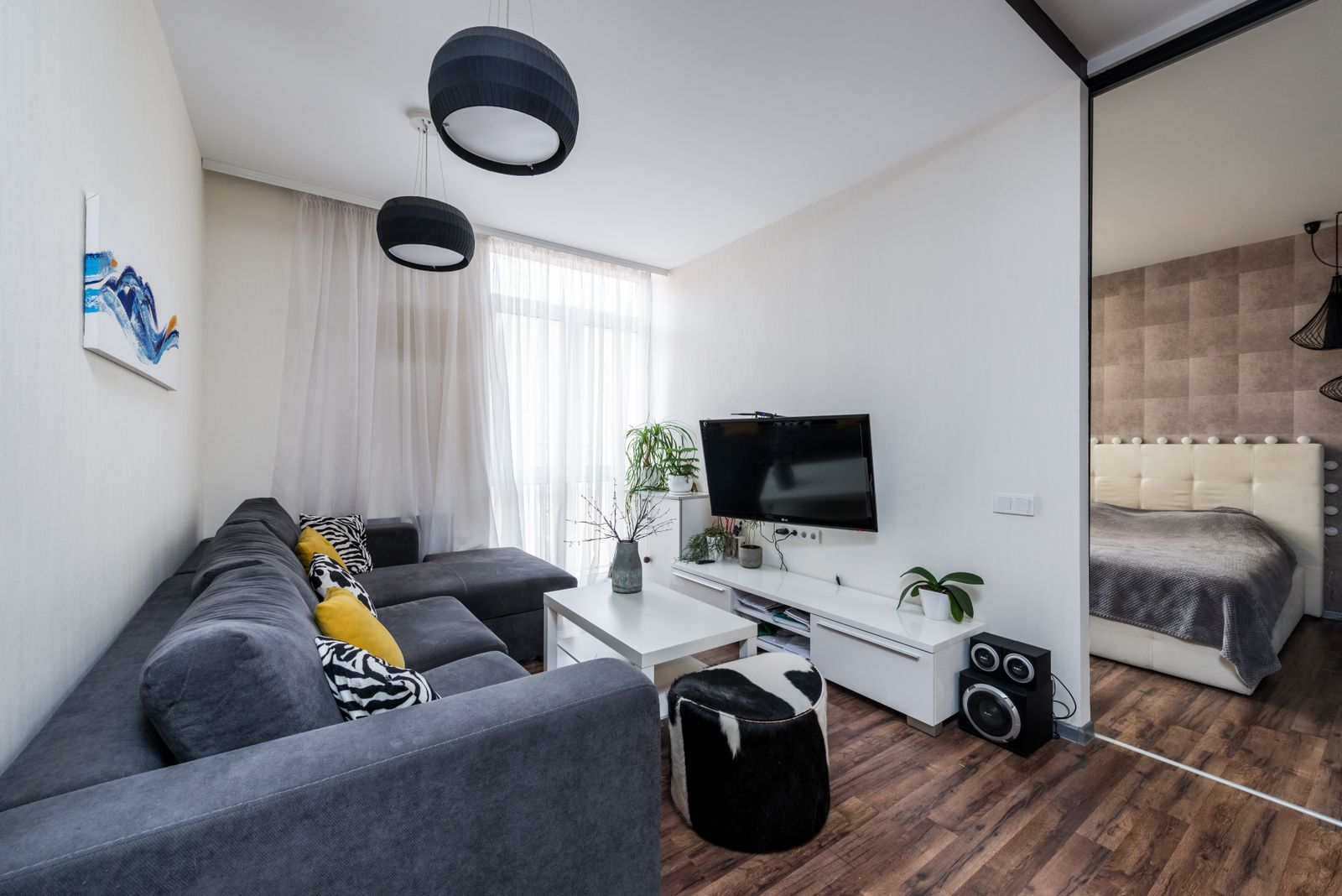 Bright room with a plain tiled floor and plants