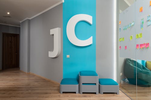 Free Hallway of company with letters on wall Stock Photo