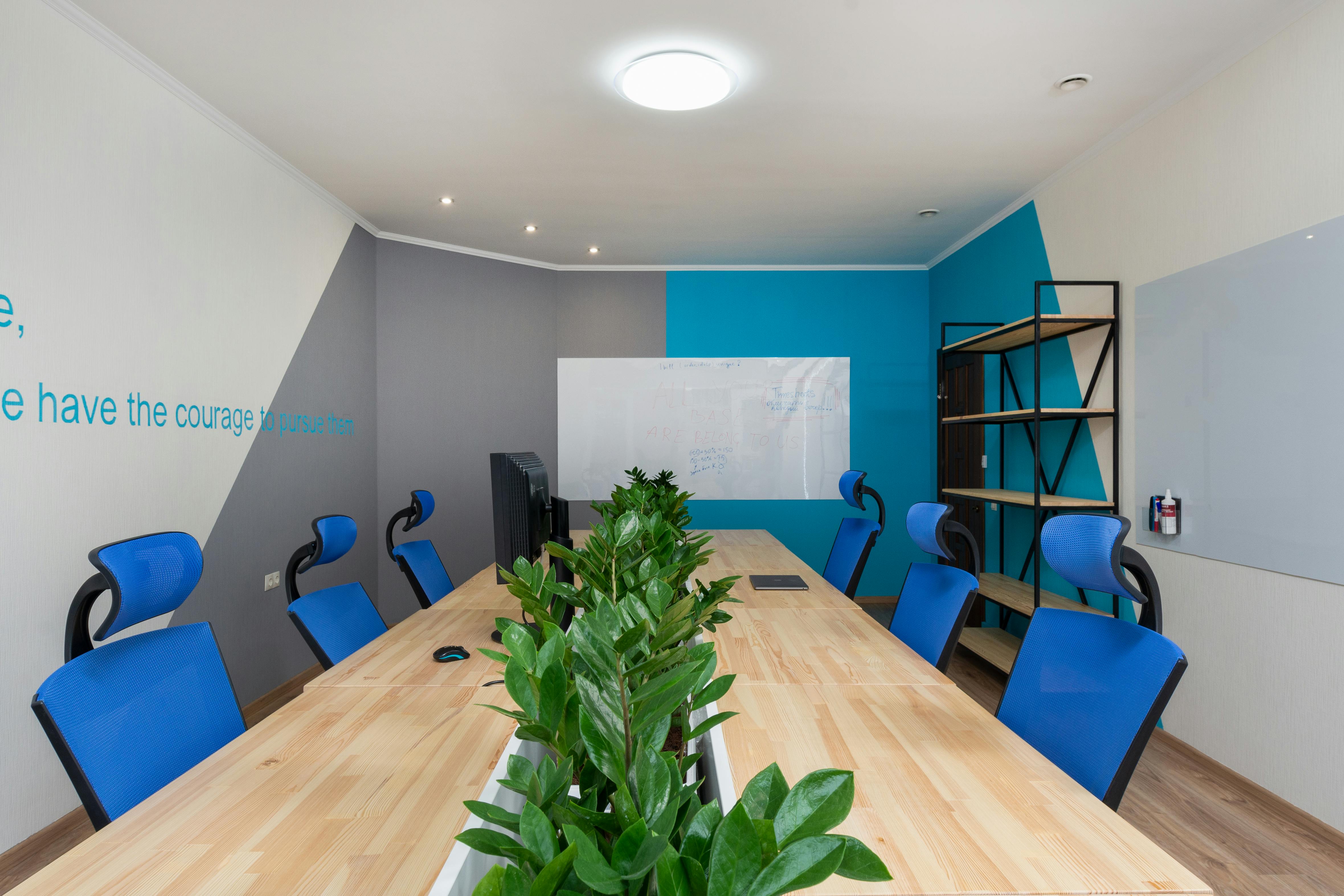 table with plants in boardroom