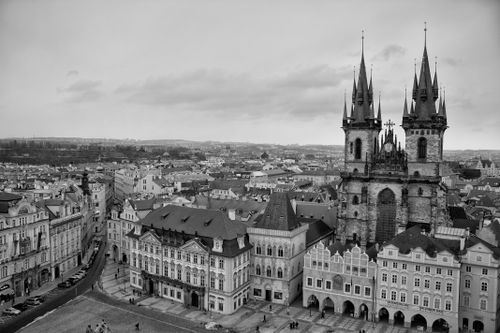 Free A stunning aerial shot of Prague's historic cityscape in black and white, featuring iconic gothic architecture. Stock Photo