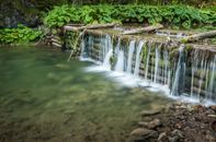 Water Falls on Brown Rocks