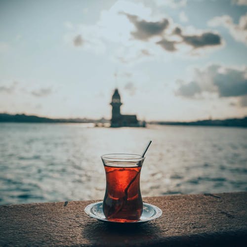 Shallow Focus of Turkish Tea on Concrete Surface