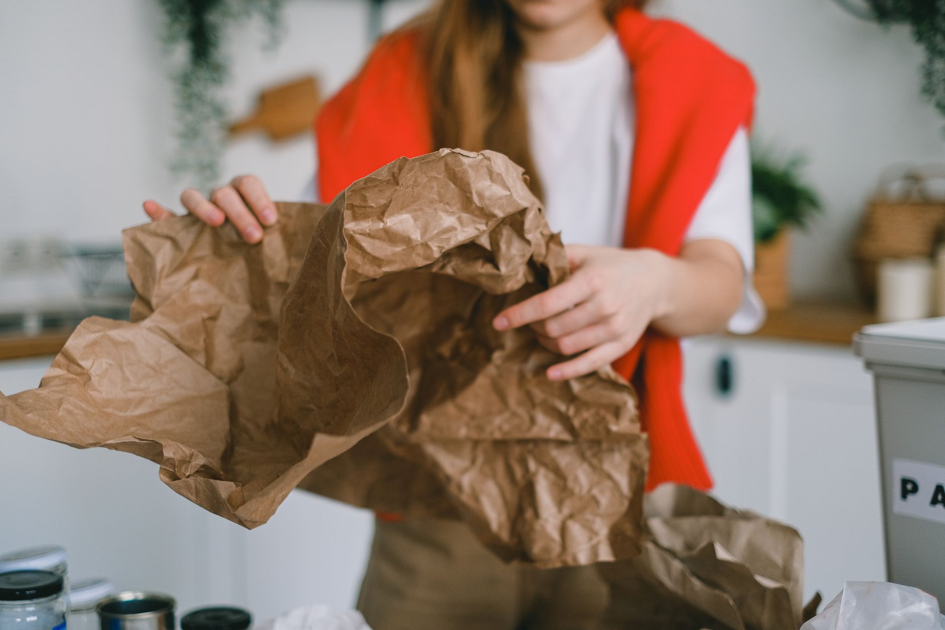 eco friendly protective packaging with paper cushions on a clean shipping table