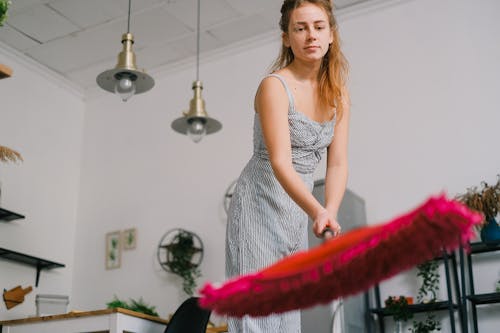 Free Crop housewife preparing to mop floor at home Stock Photo