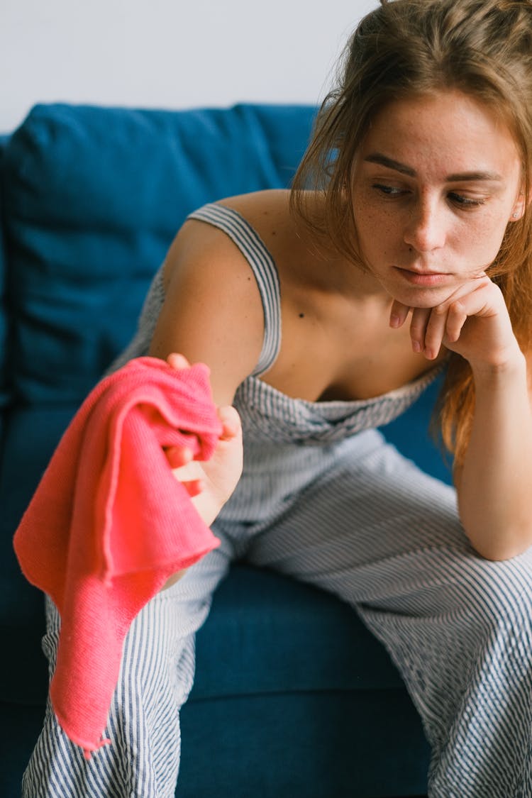 Exhausted Housewife Preparing To Wipe Dust