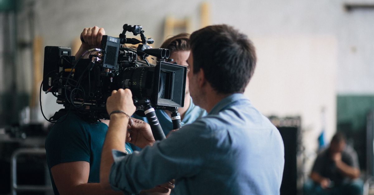 Hollywood film set with cameras and crew filming a scene