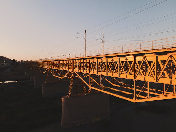 Sunlit Bridge At Sunset