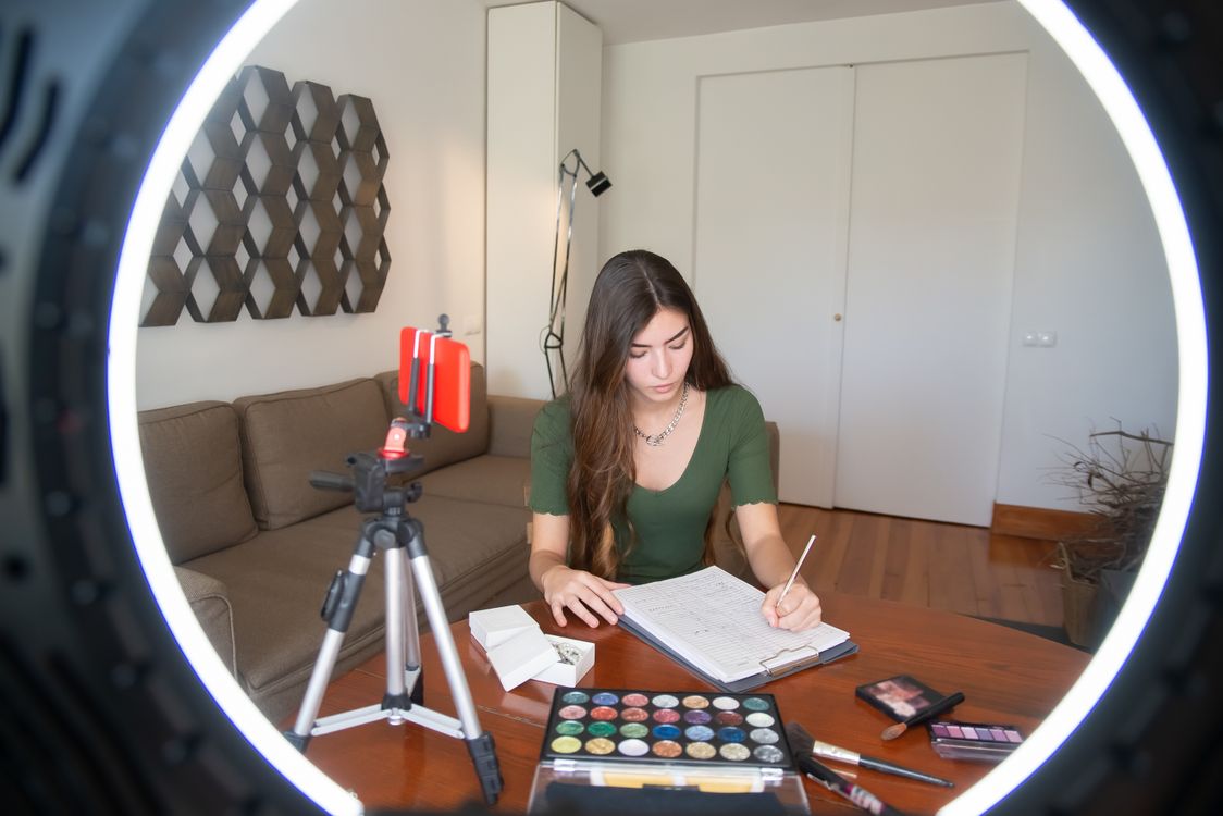 A person sitting and writing