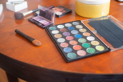 Eyeshadow Makeup on the Wooden Table