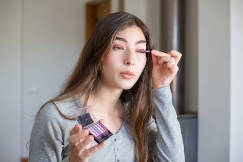 Woman Applying Eyeshadow