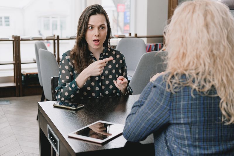 Instructor gesturing mid-conversation — SHVETS production on Pexels