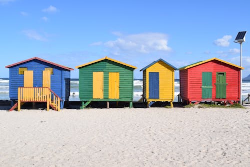 Colorful Wooden Huts on Beach