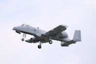 Gray Fighter Jet in Mid Air