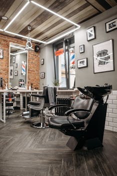 Sleek barber shop showcasing contemporary interior design and equipment.